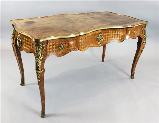 A Louis XV style kingwood and parquetry bureau plat, W.4ft 9in. D.2ft 7in. H.2ft 6in.